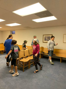 Kids playing musical chairs.