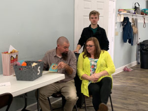 Robert & Michelle opening gifts.