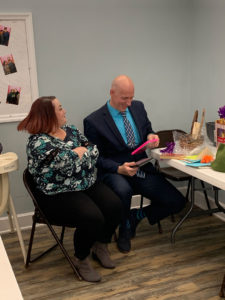 Steve & Amber opening gifts.