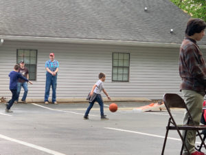 Mikey playing basketball.