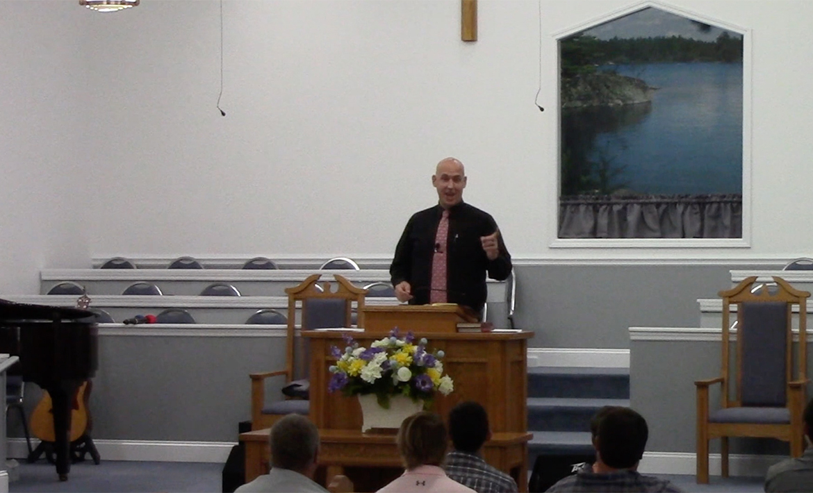 Steve Moore preaching.